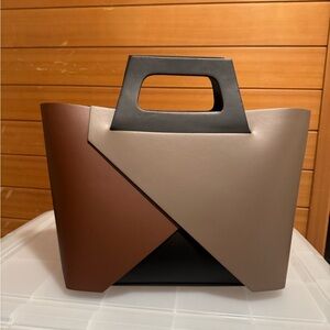 Beautiful leather bag. Never used. In perfect condition. Purchased in Italy